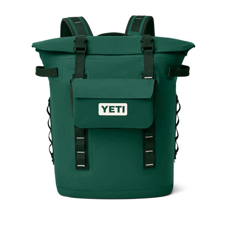 Green YETI backpack on a white background