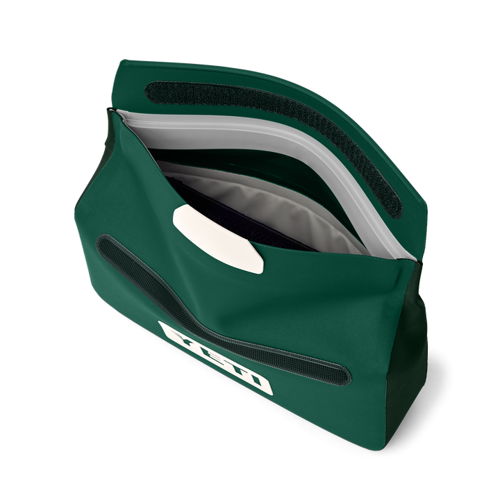 Green bag with a white logo on a white background