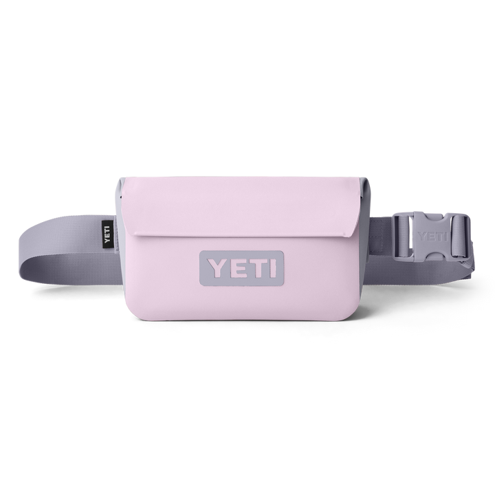 Pink YETI waist bag with a gray strap on a white background