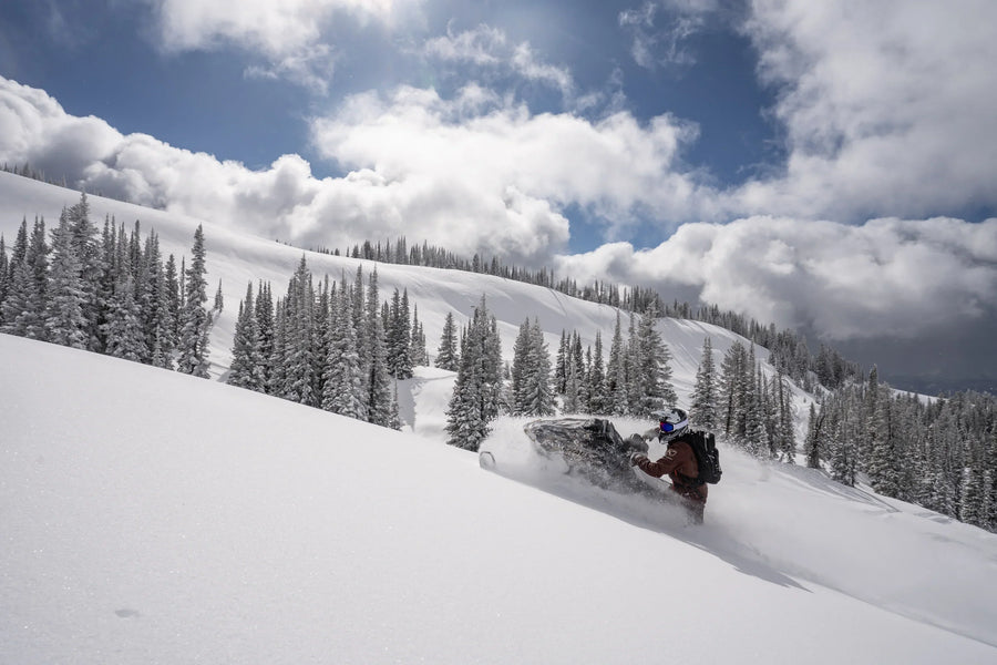 What to Wear Under Snowmobile Gear: A Guide to Base and Mid-Layers
