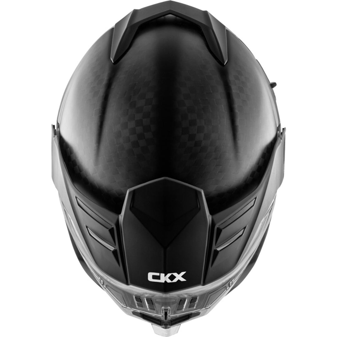 Black snowmobile helmet with 'CKX' branding on a white background