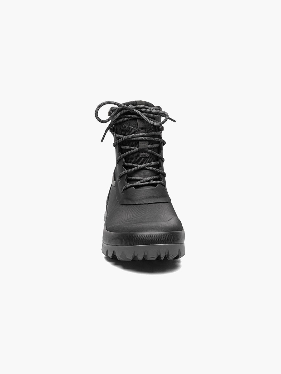 Black boot with laces on a white background