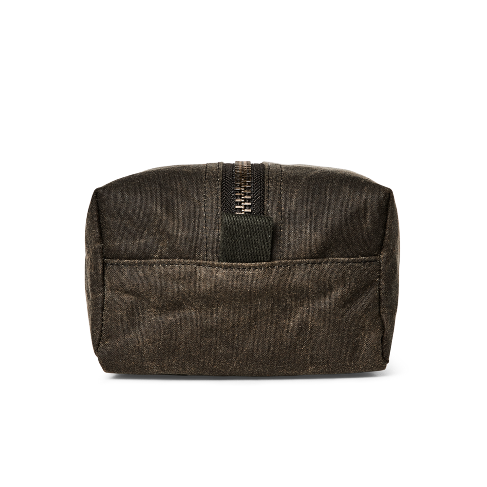 A dark brown waxed canvas zippered pouch with a black zipper pull tab, shown against a plain white background.