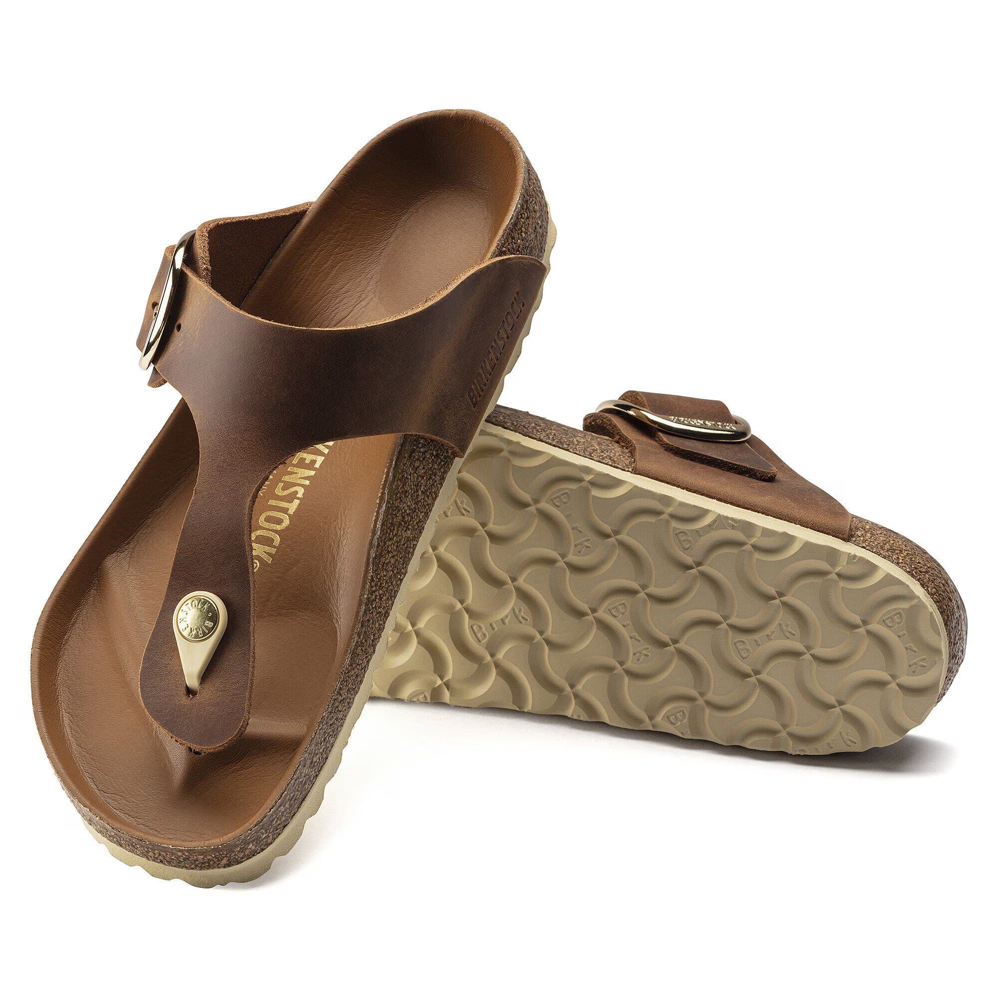 Pair of brown sandals with a visible brand logo on a white background