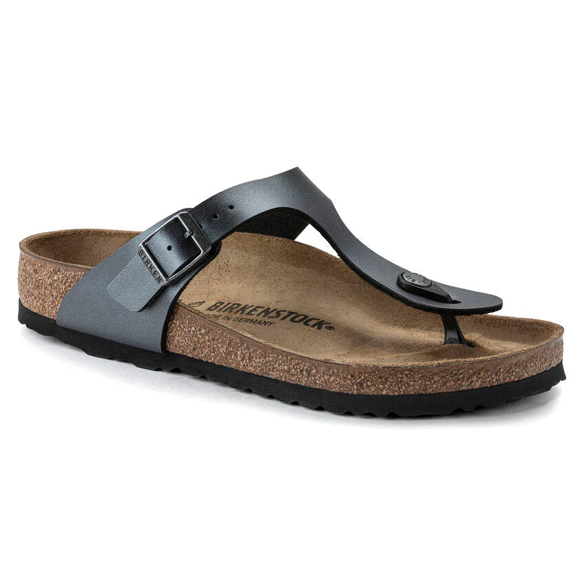 Birkenstock sandal with black strap and cork sole on a white background