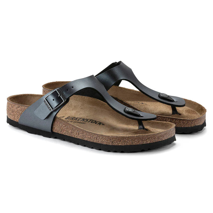 Pair of Birkenstock sandals with black straps on a white background