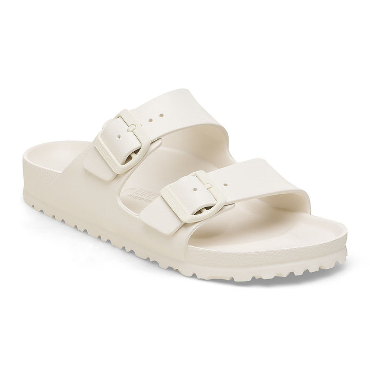 White sandal with two straps on a white background