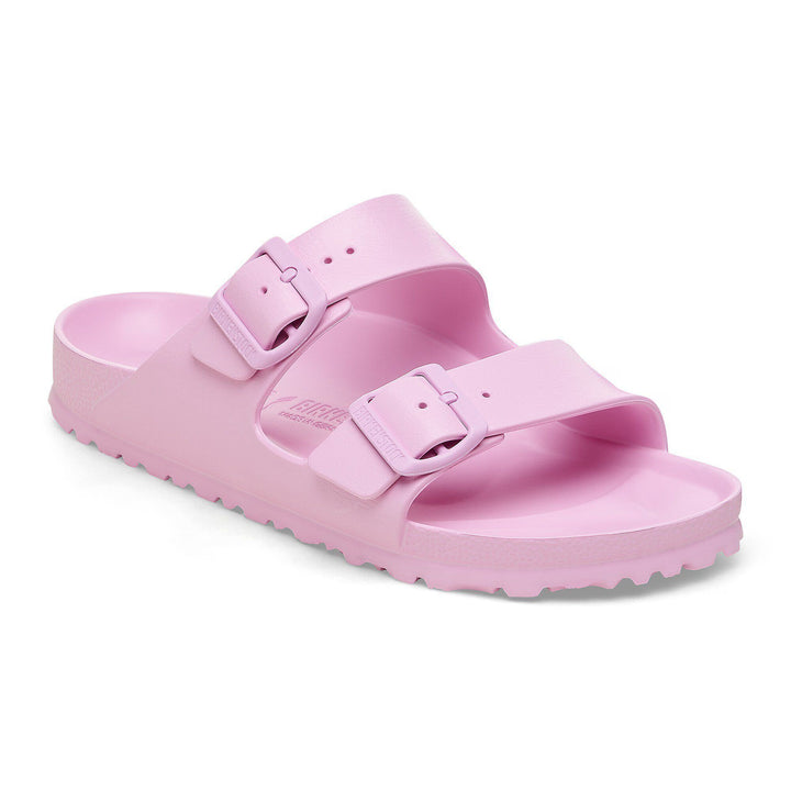 Pink sandal with a strap on a white background