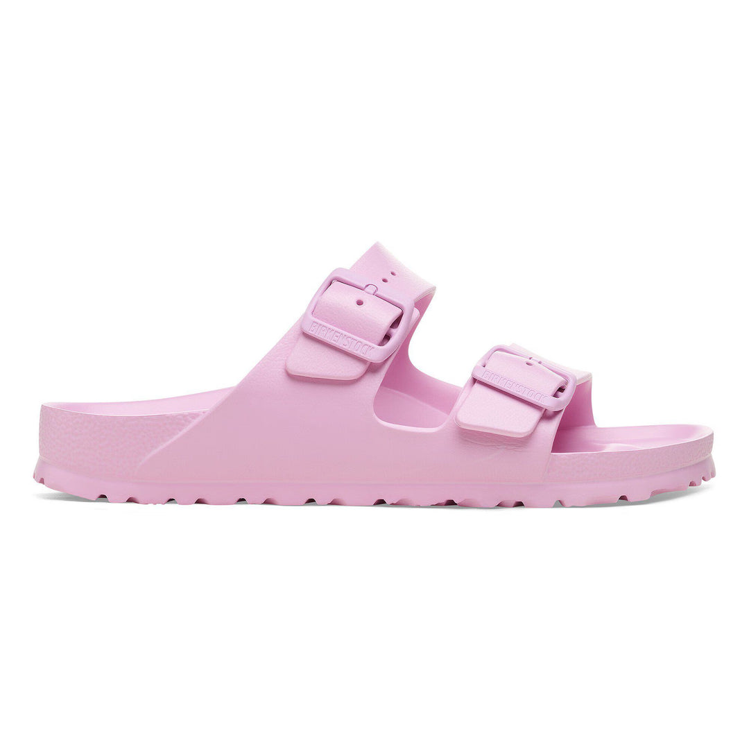 Pink sandal with double buckle on a white background