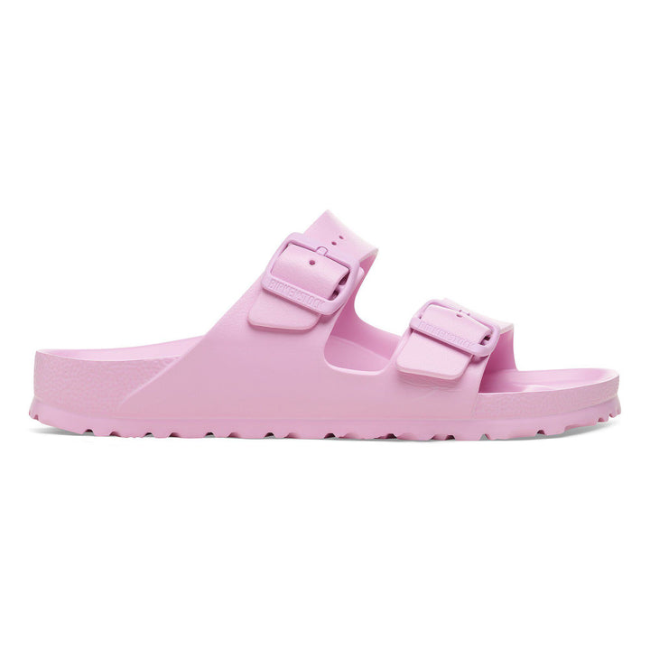 Pink sandal with double buckle on a white background