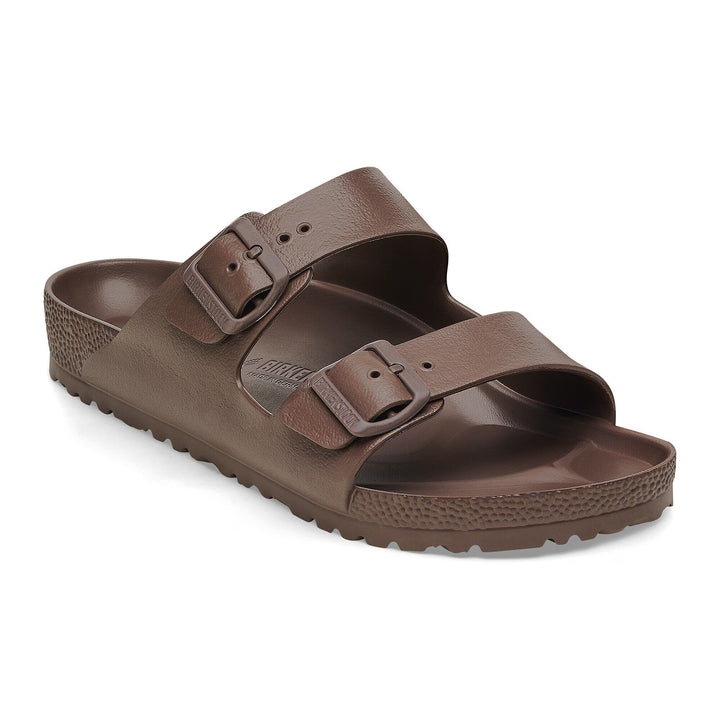 Brown sandal with double buckle on a white background