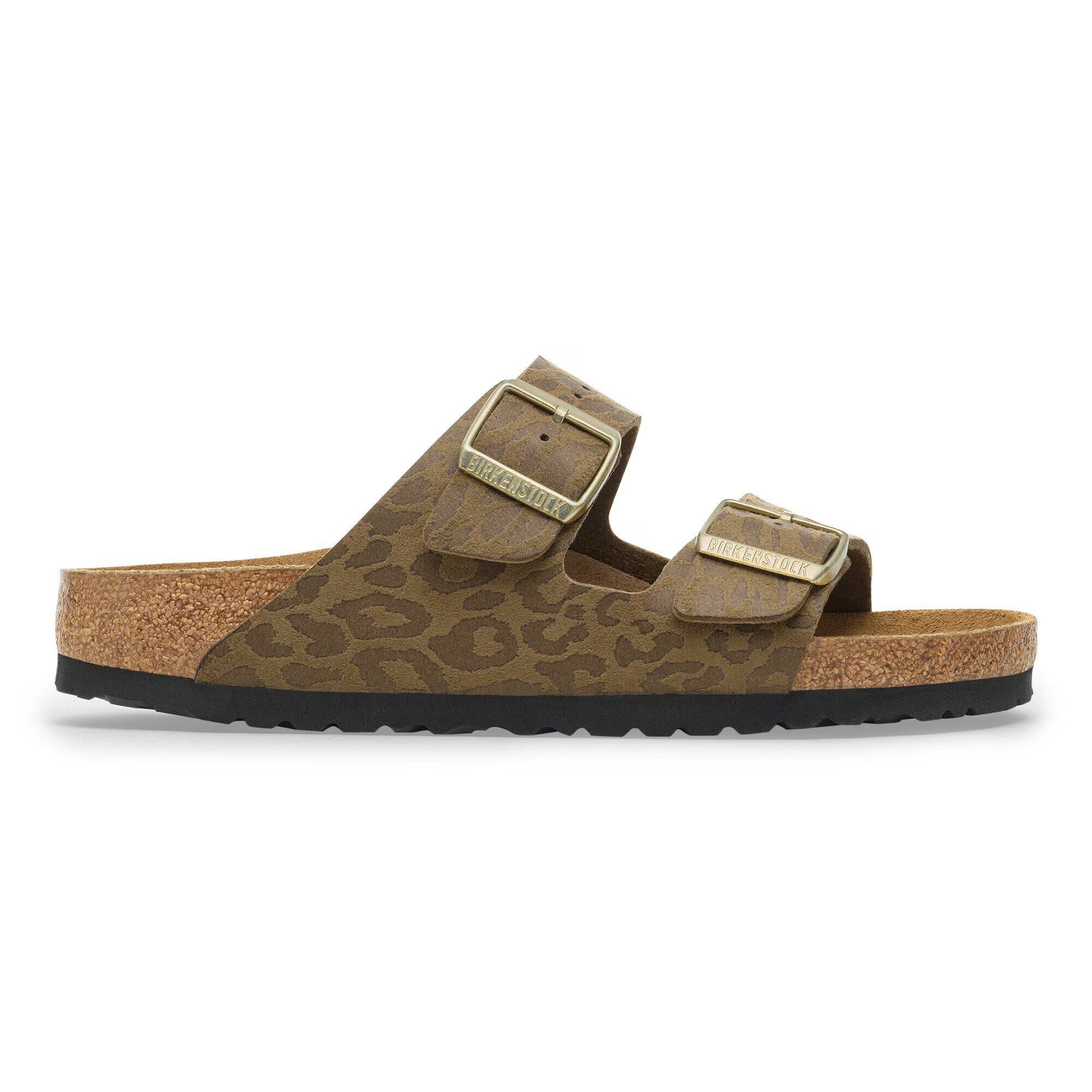 Brown sandal with cork sole on a white background