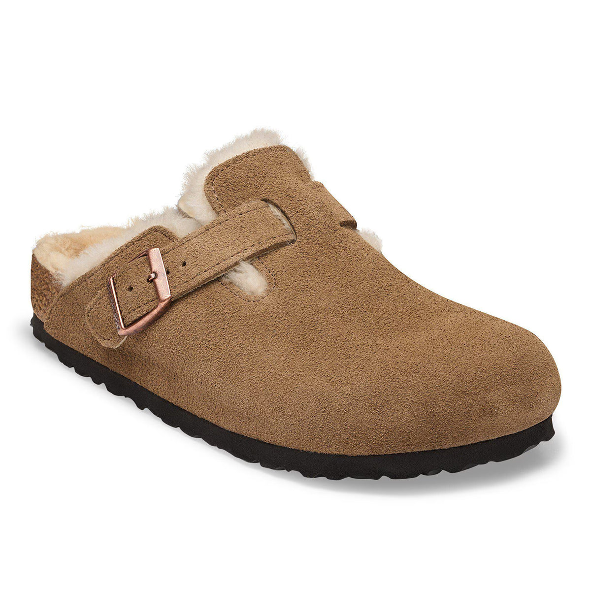 Brown suede slipper with shearling lining and buckle on a white background