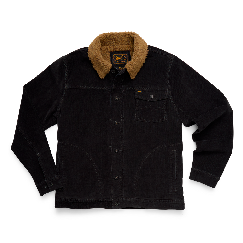 A black corduroy overshirt jacket with a tan fleece collar, featuring a button-down front, chest pocket, and a visible Carhartt brand label on the inner neck.