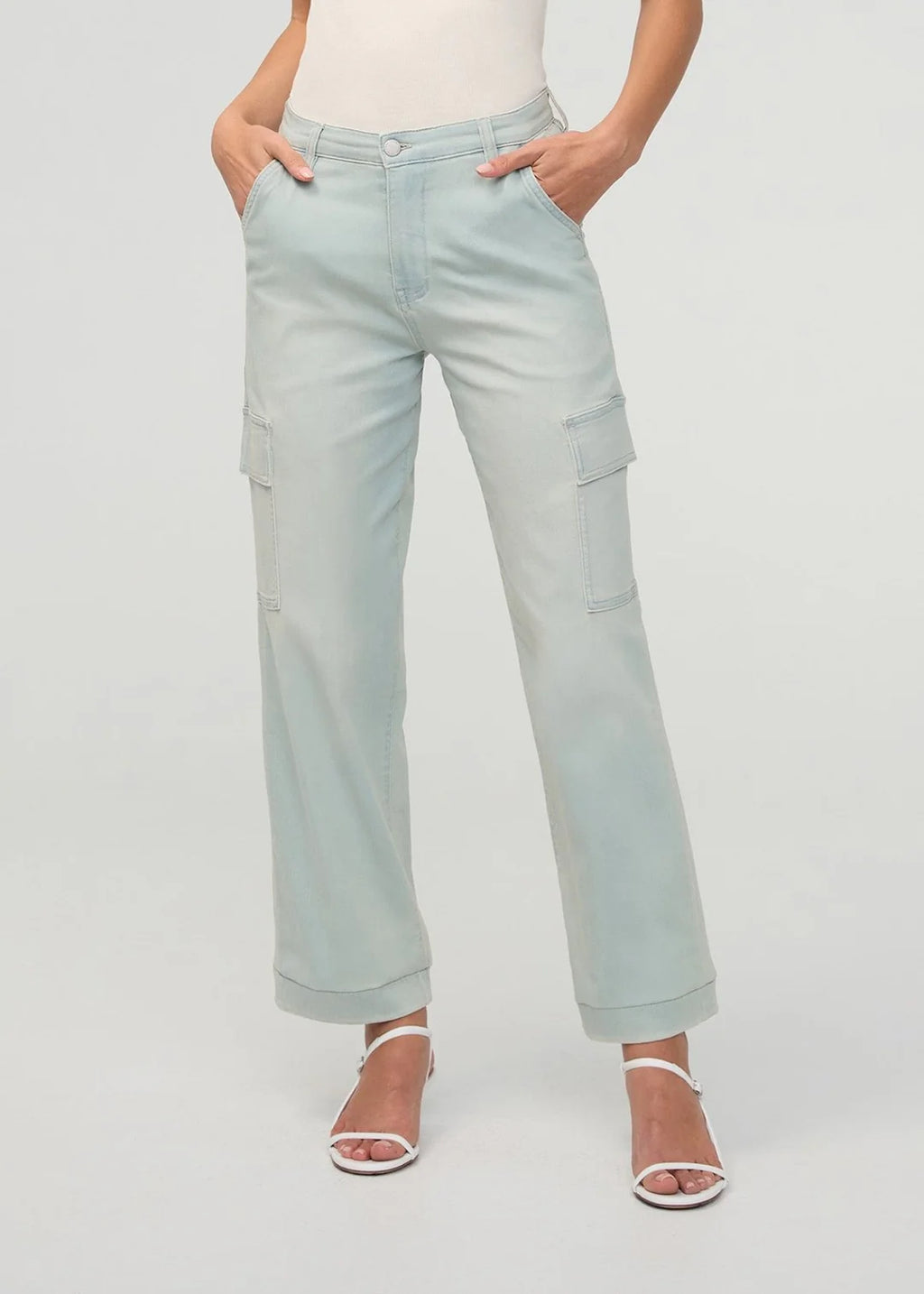 Light blue pants worn by a person on a white background