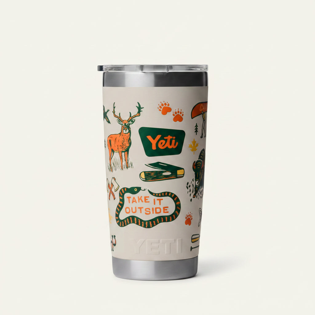 YETI tumbler with nature-themed design and 'Take It Outside' text on a beige background