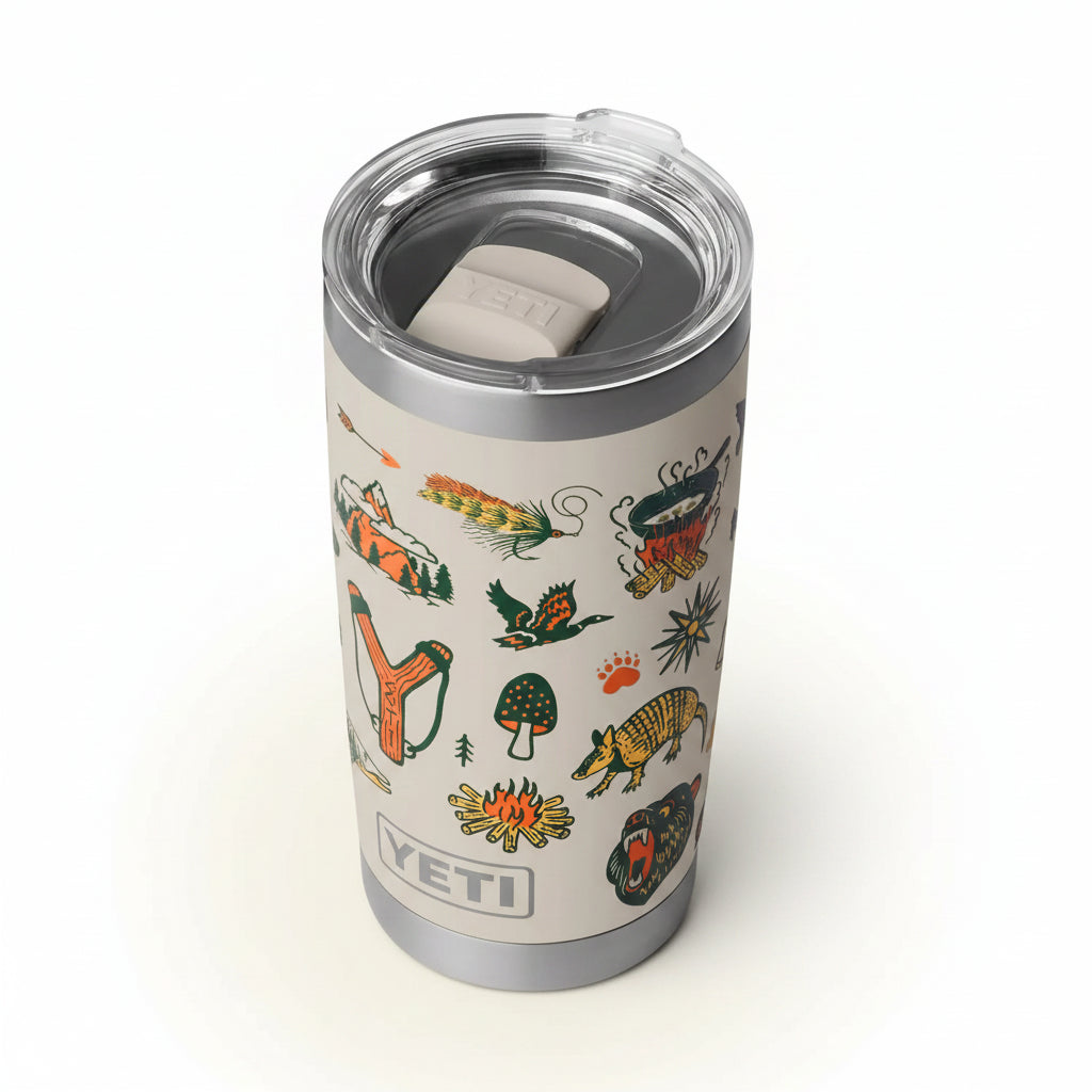 YETI tumbler with nature-themed illustrations on a beige background