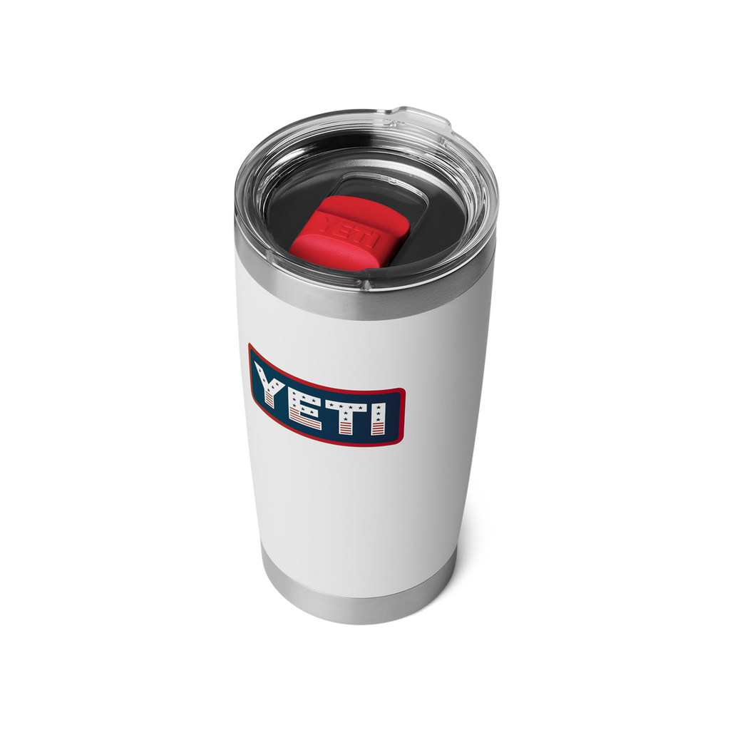 White YETI tumbler with a red interior on a white background