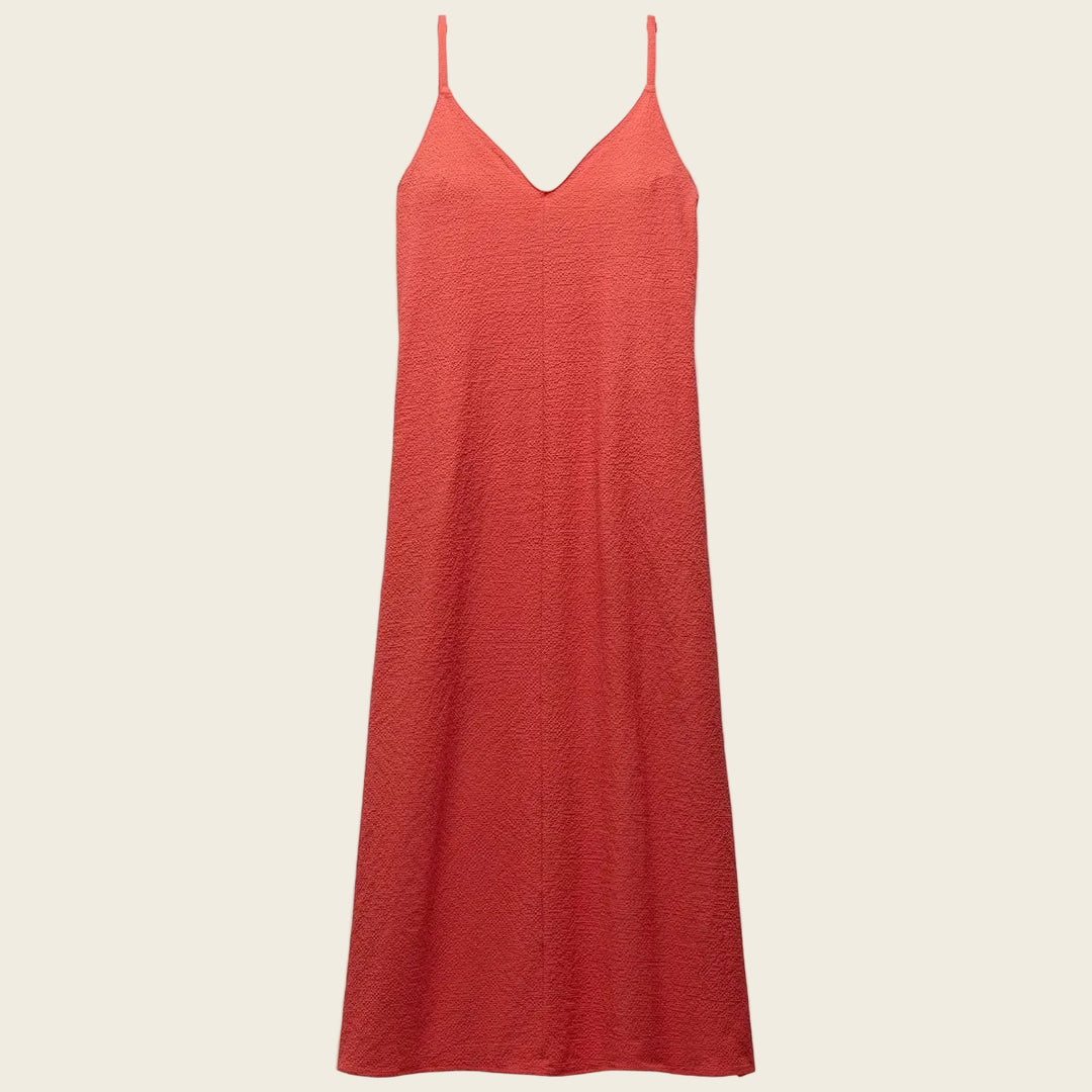 Red slip dress on a white background