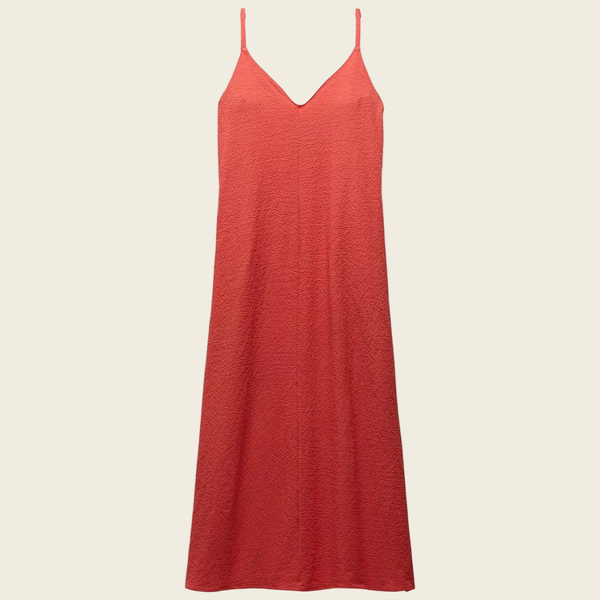 Red slip dress on a white background