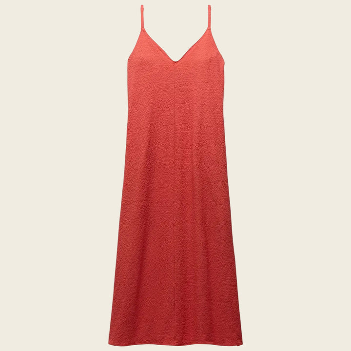 Red slip dress on a white background