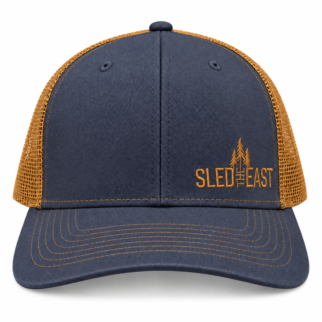 Sled The East Throttle Curved Brim Trucker Hat in Navy/Gold
