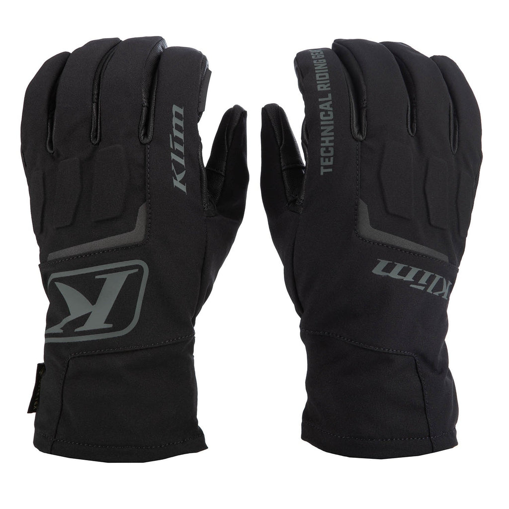 A pair of black technical riding gloves shown from both the front and back. The gloves feature gray branding, including the 'Klim' logo and 'Technical Riding' text, on a solid white background.