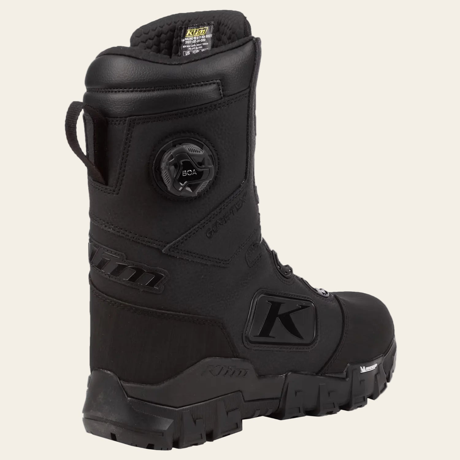 A black K2B tactical boot with a dial closure system on the side, shown from a three-quarters angle against a plain white background.
