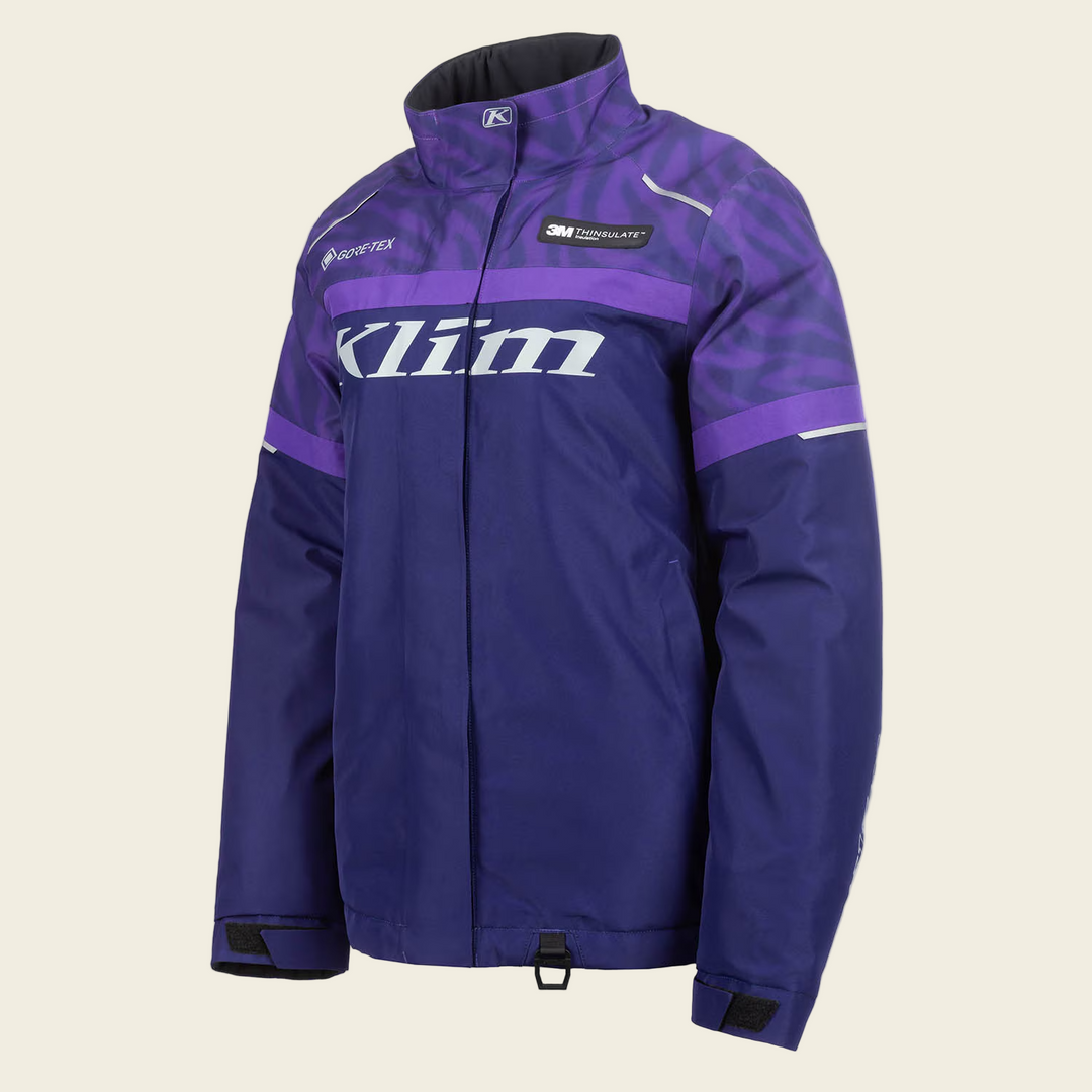 Purple and black jacket with Klim branding on a white background