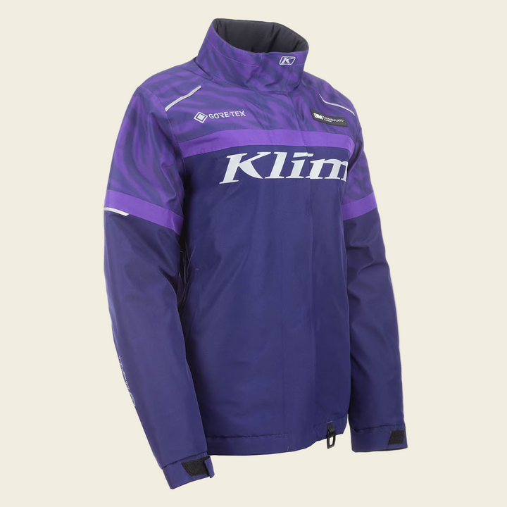 Purple and blue jacket with Klim branding on a white background