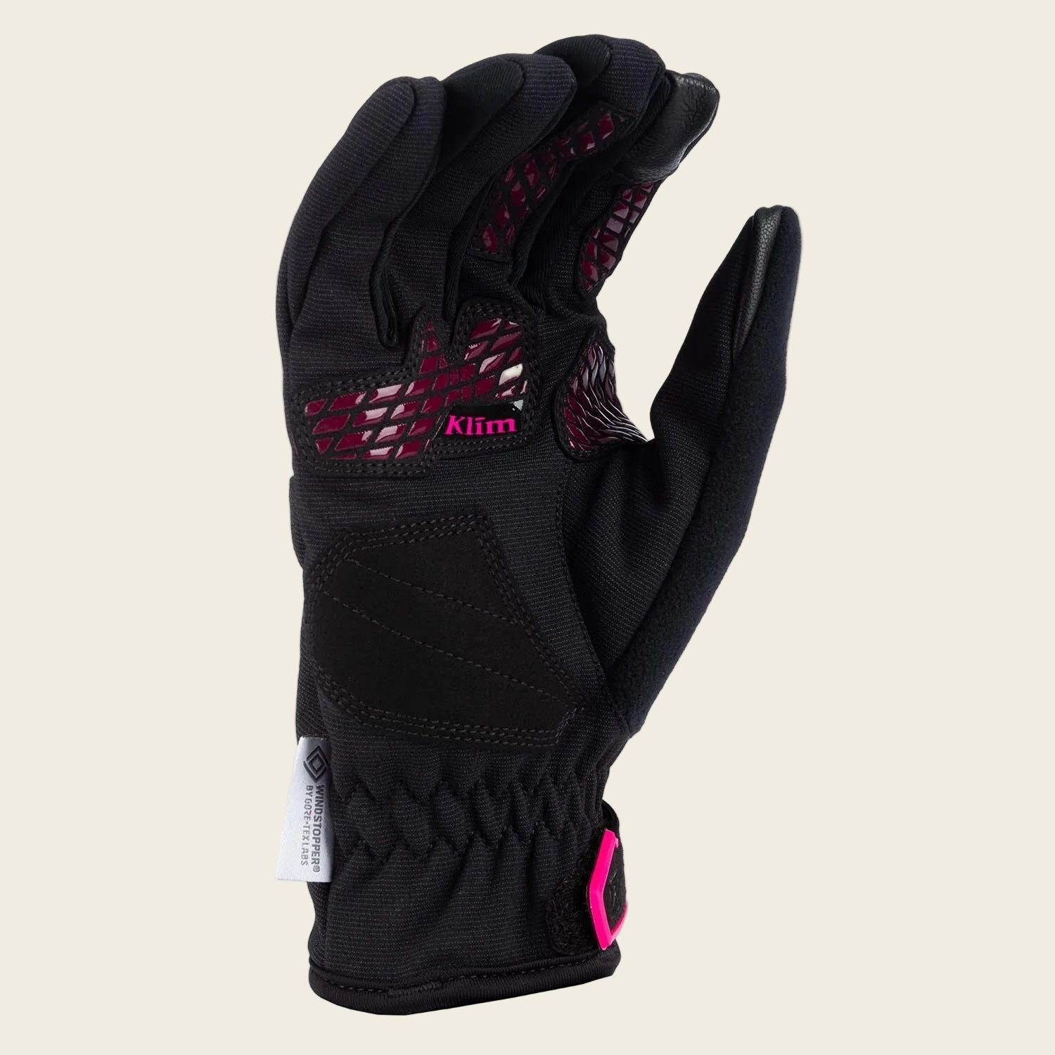 Black glove with pink accents and Klim logo on a white background