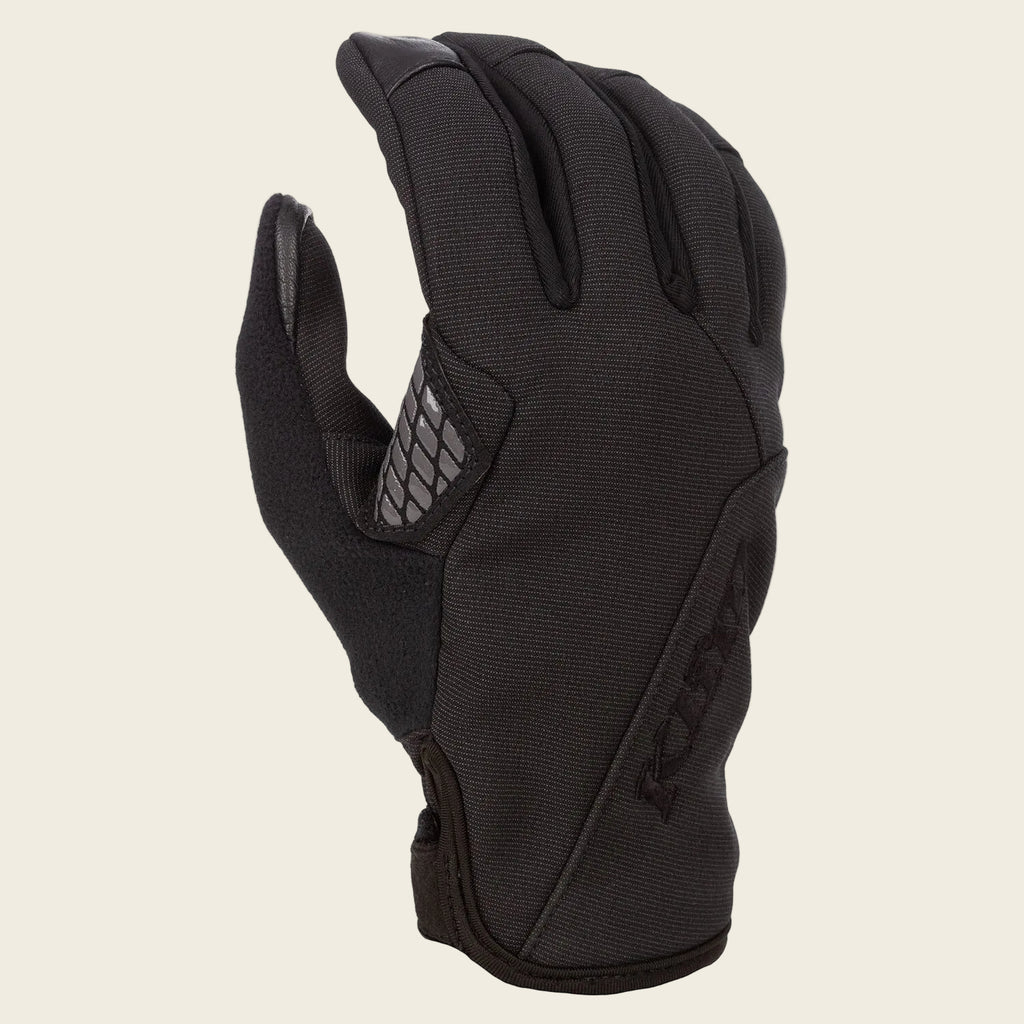 Black glove with textured palm on a white background