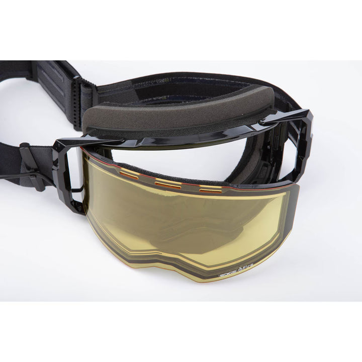 Black goggles with a gold visor on a white background