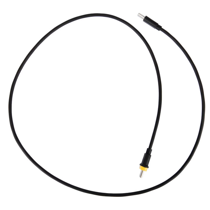 Black cable with a metallic connector on a white background