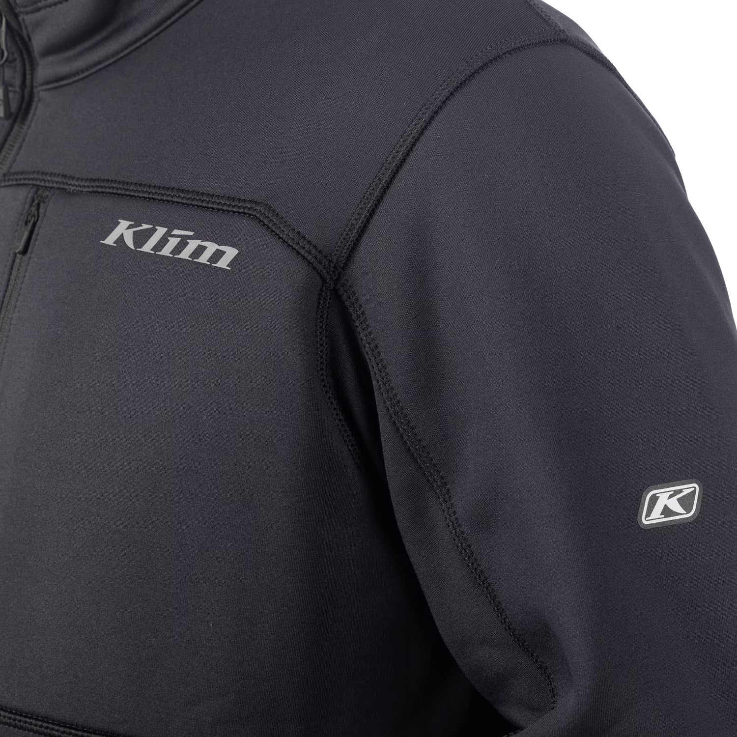 Black jacket with Klim branding on a white background