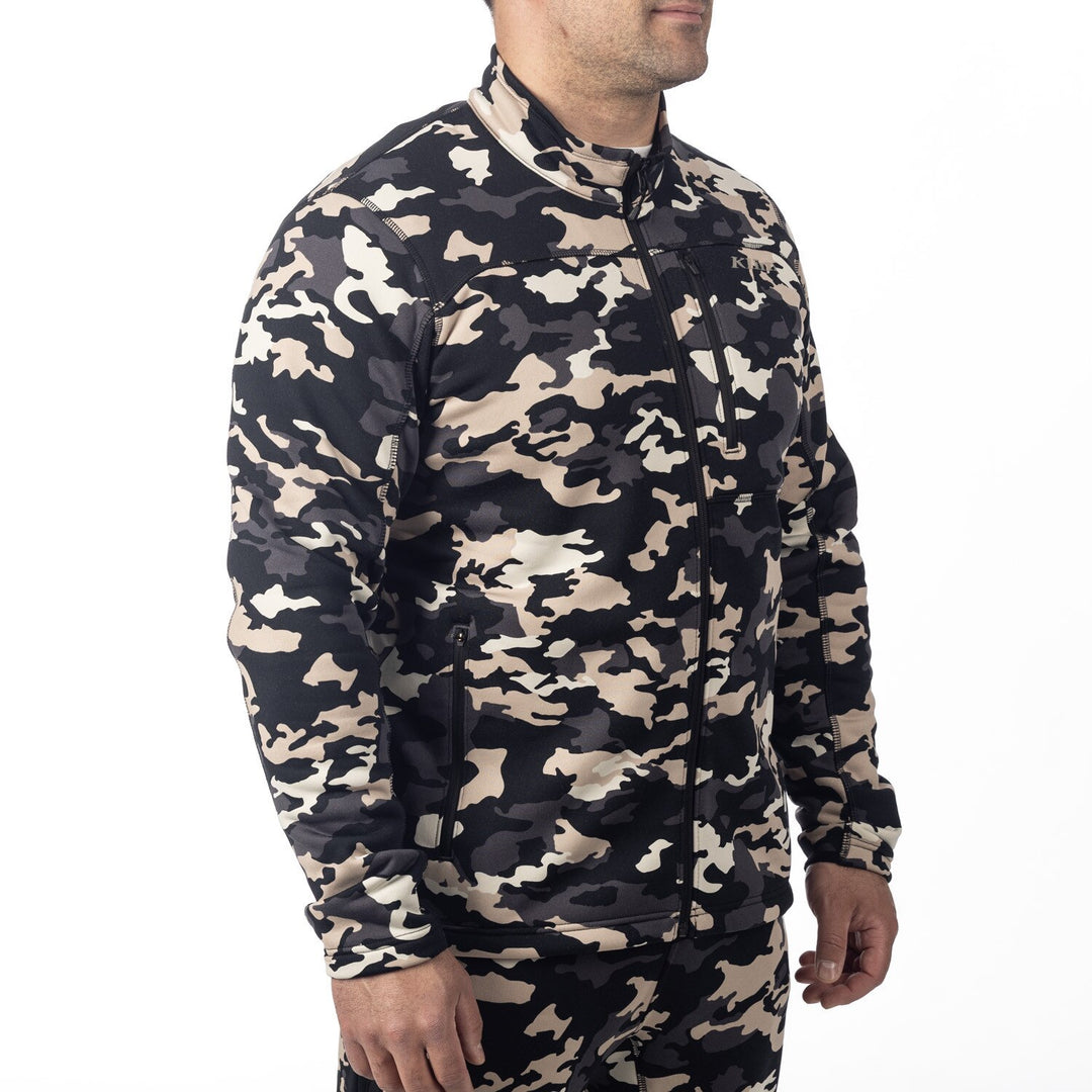 Person wearing a camouflage shirt on a white background