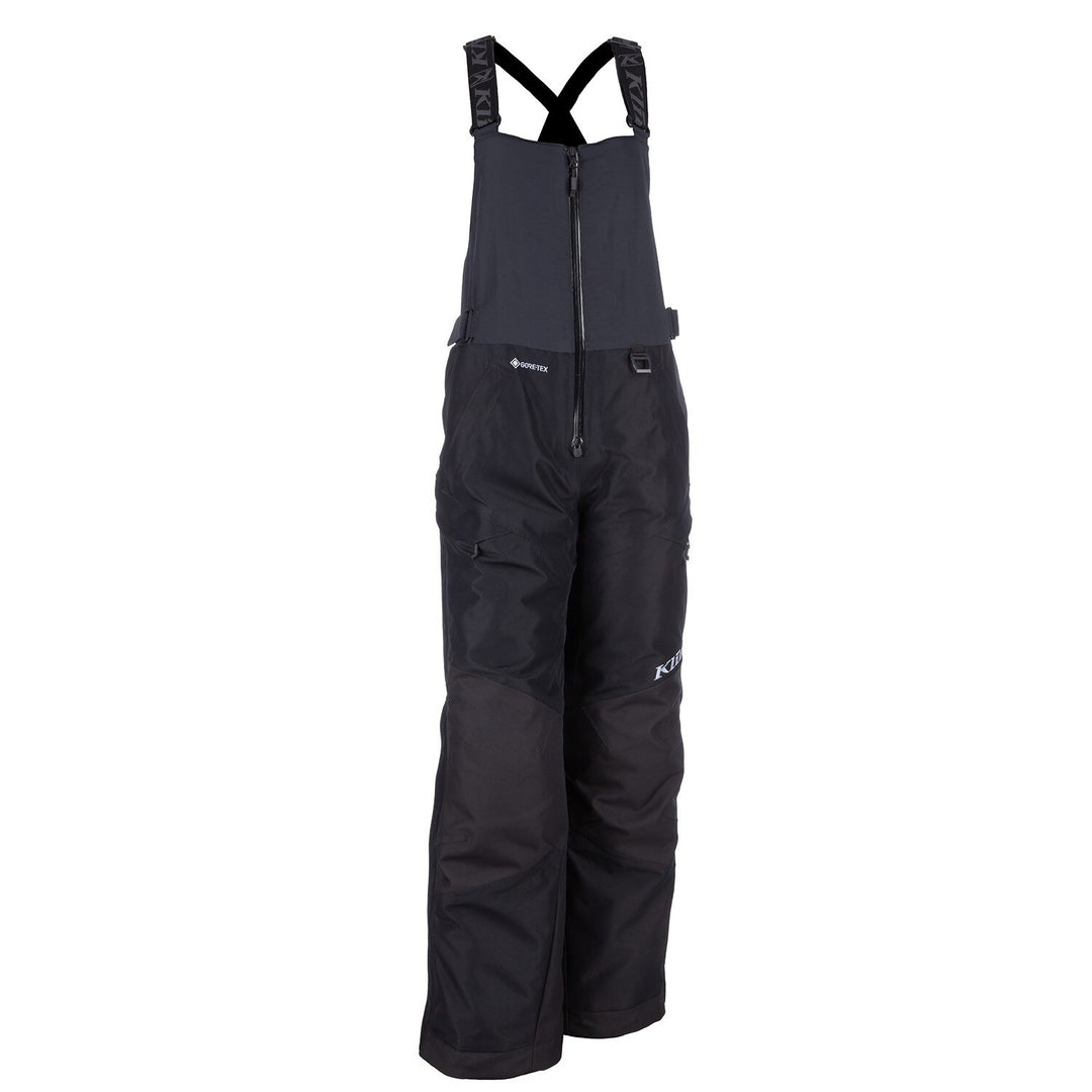 Black snow pants with suspenders on a white background