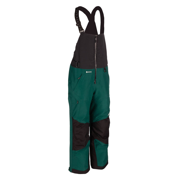 Green and black bib overalls on a white background