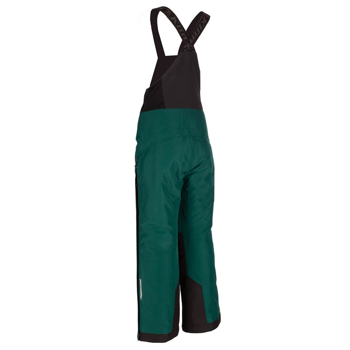 Green bib overalls with black accents on a white background