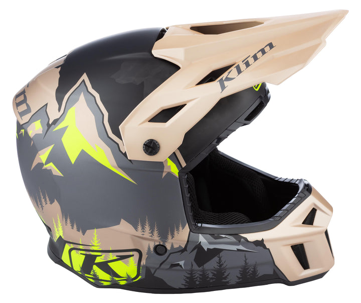 Klim motorcycle helmet with a camouflage design on a white background