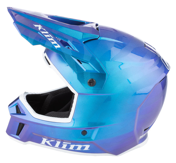 Blue and purple Klim motorcycle helmet on a white background