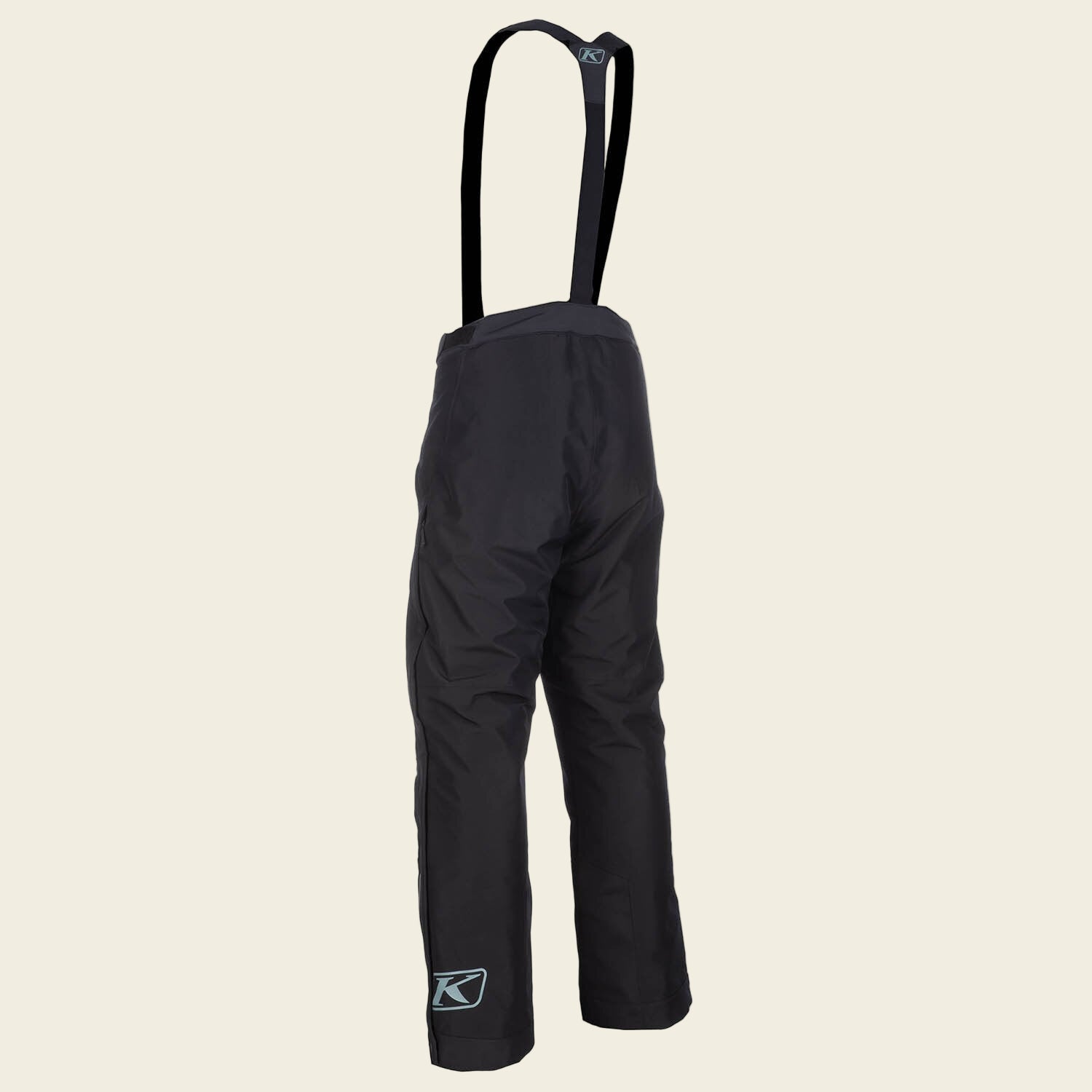 Black snow pants with suspenders on a white background