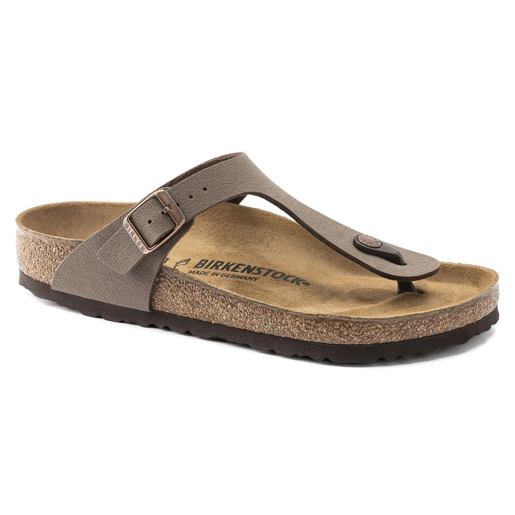 Brown sandal with cork sole on a white background