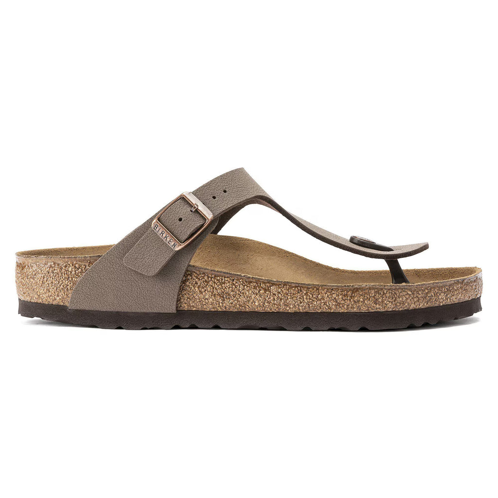 Brown sandal with cork sole on a white background