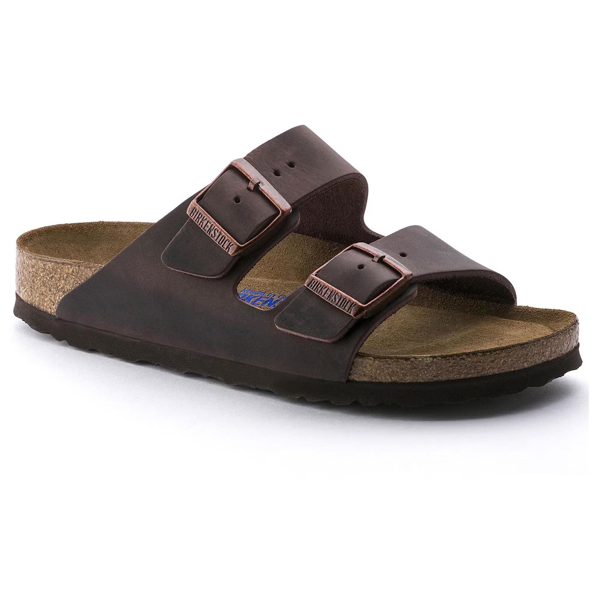 Brown sandal with cork insole on a white background