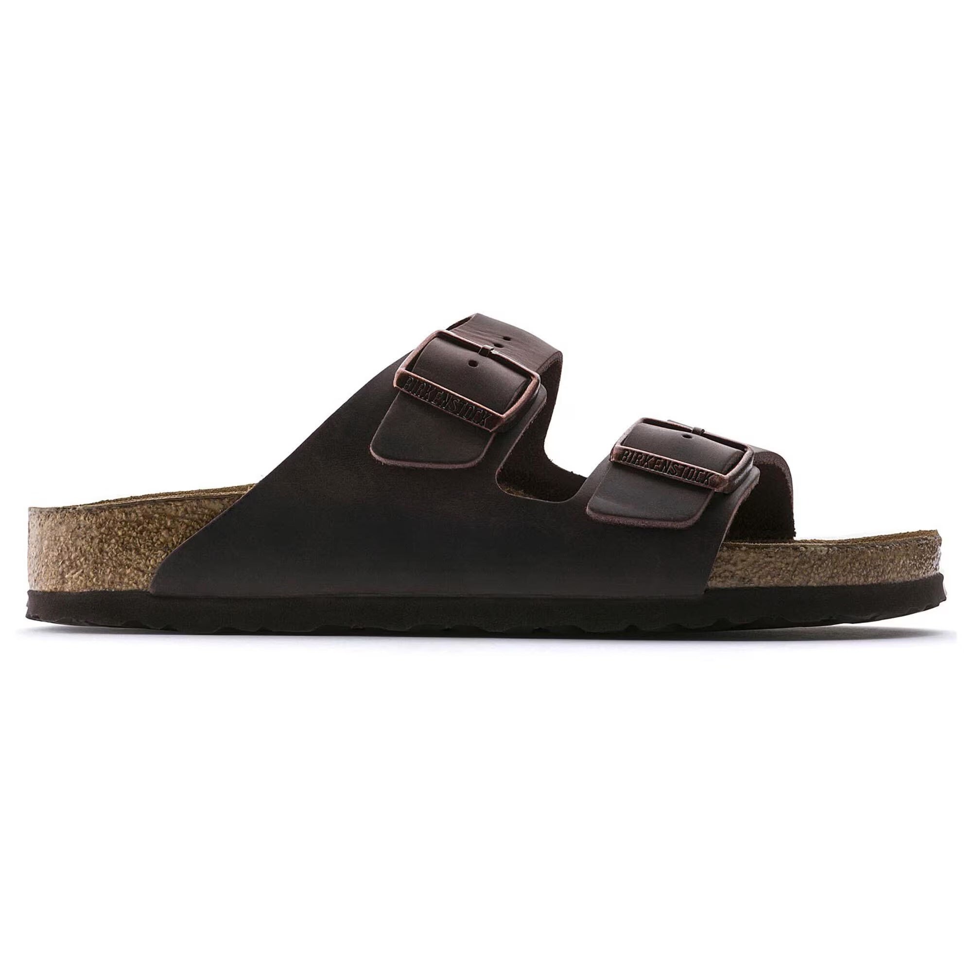 Brown sandal with cork sole on a white background