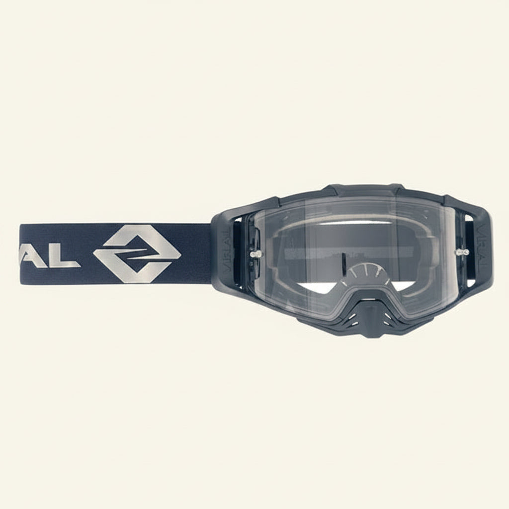 Motocross goggles with clear lens and navy blue strap featuring a logo on a white background