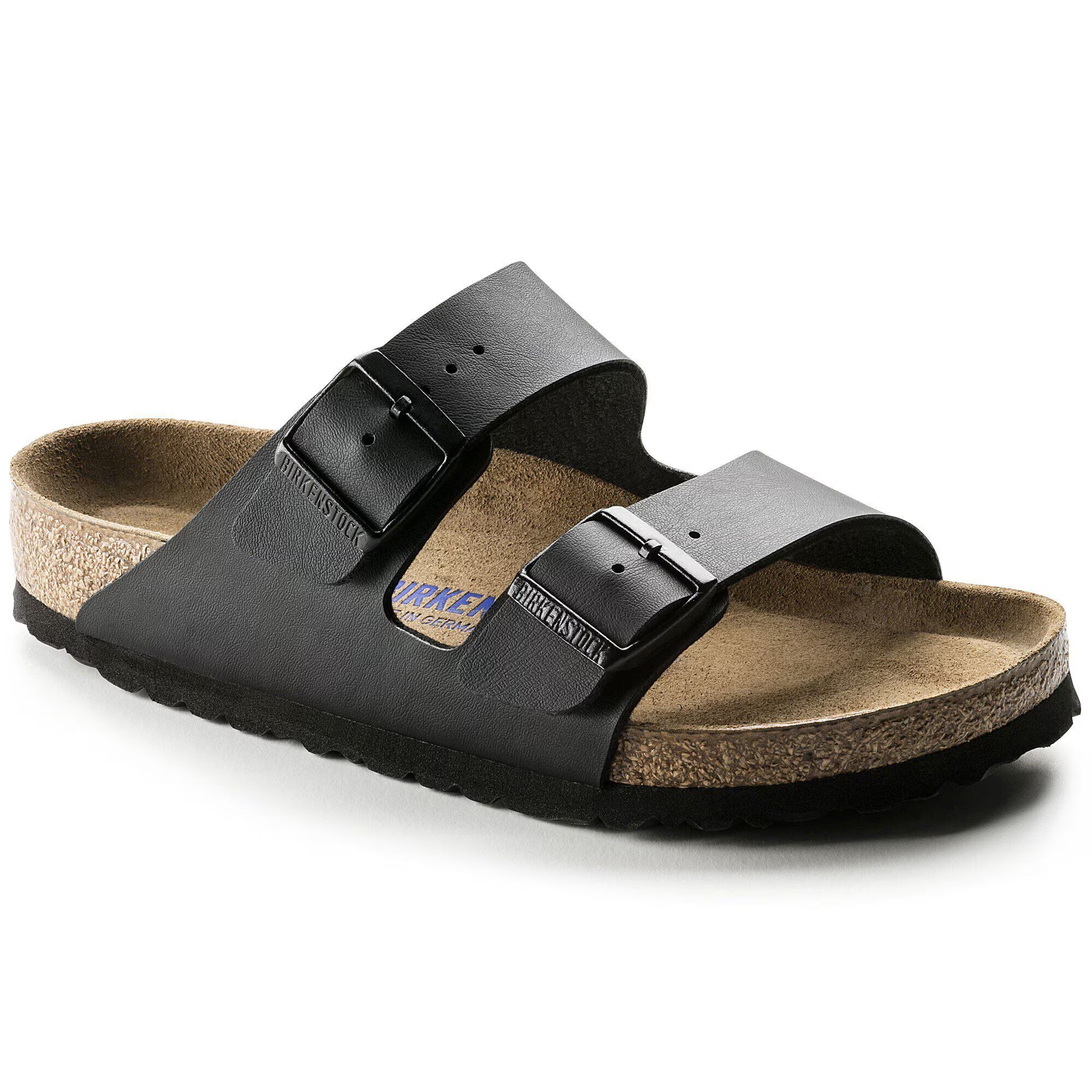 Black sandal with cork insole on a white background