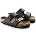 Black sandals with cork insole on a white background