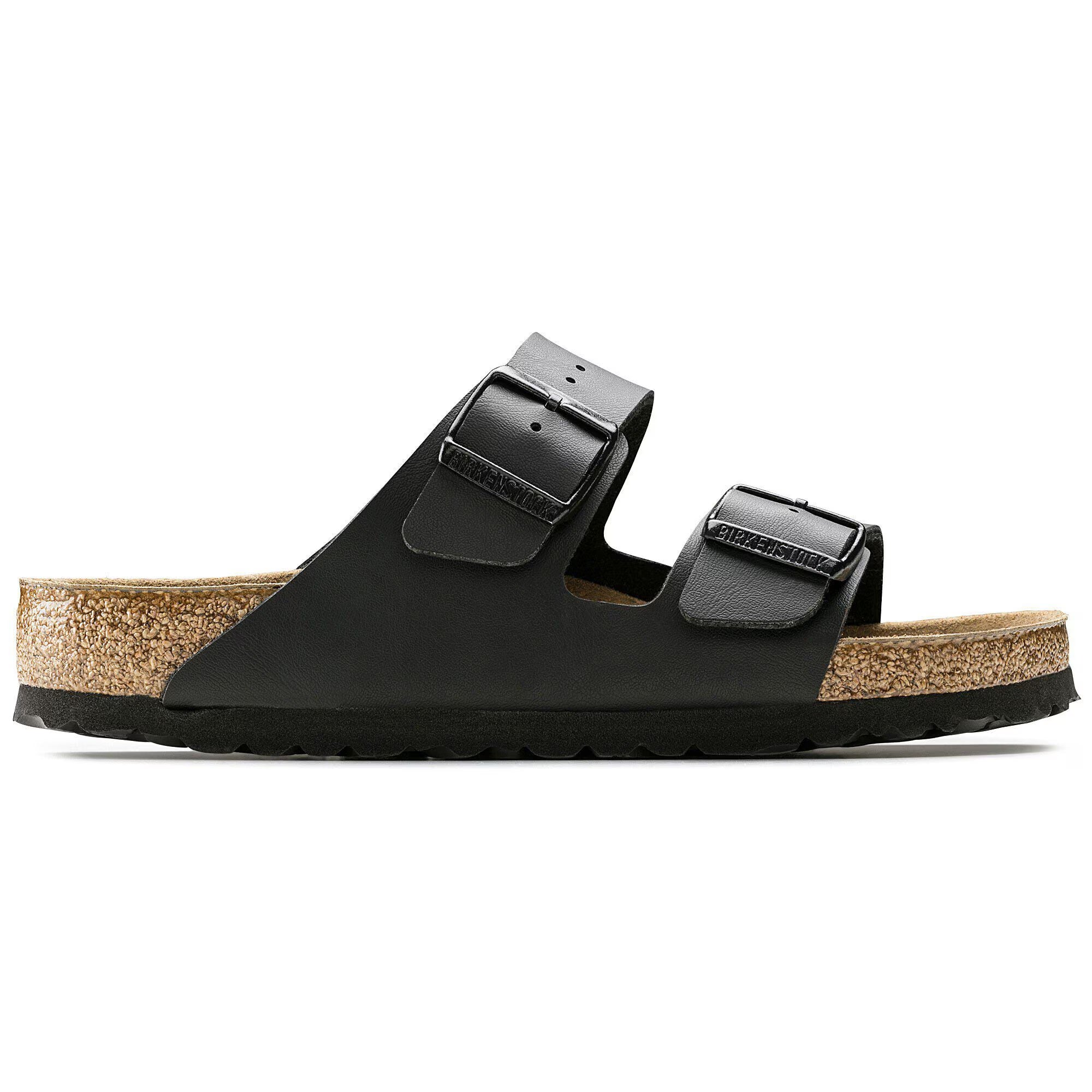 Black sandal with cork sole on a white background
